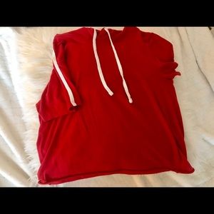 shirt with one stripe on the sides of the sleeve